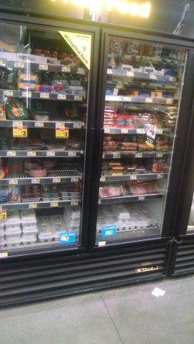 refrigerated foods in a display case
