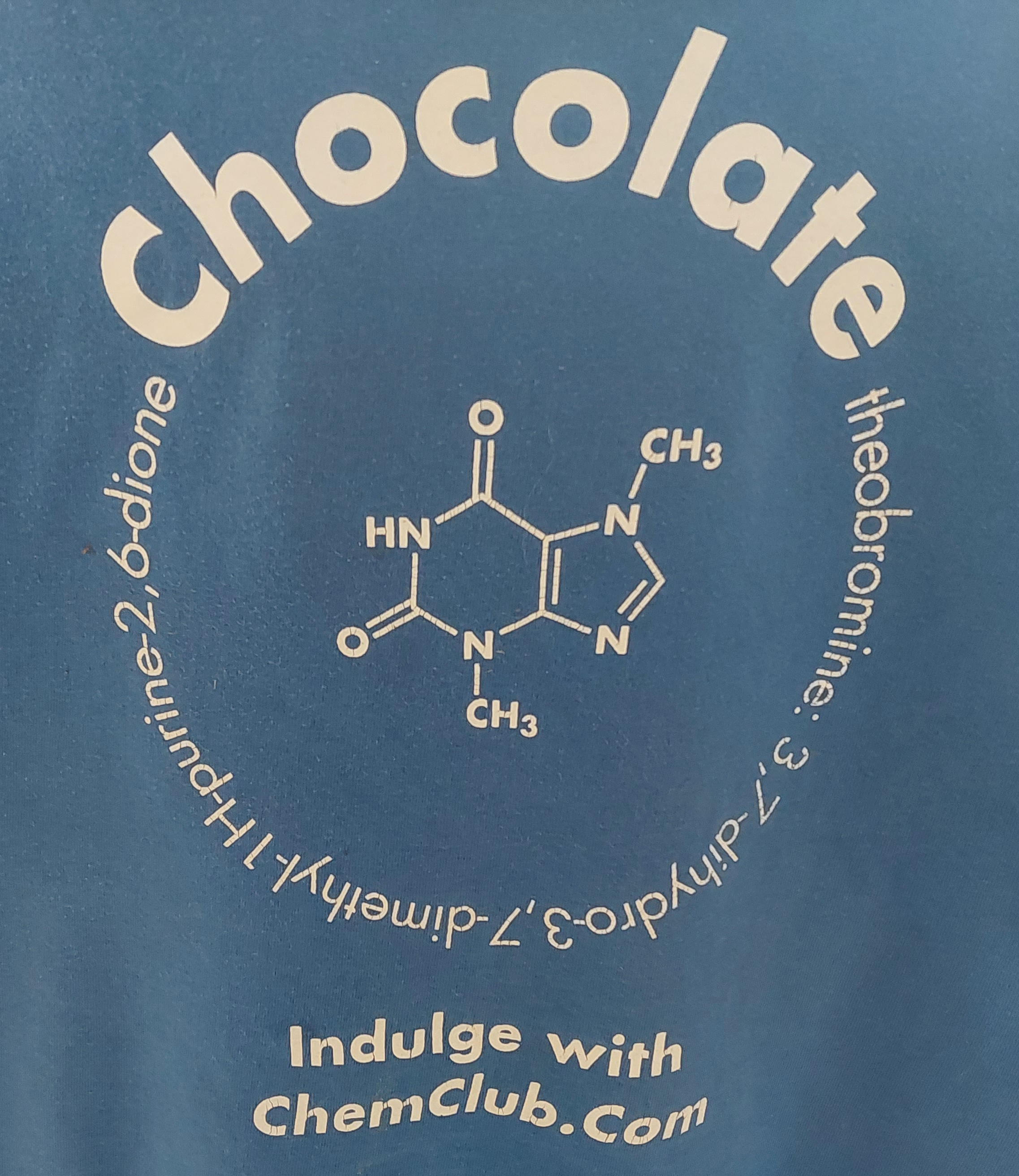 back of a tee-shirt with the structure of theobromine, a chemical in chocolate