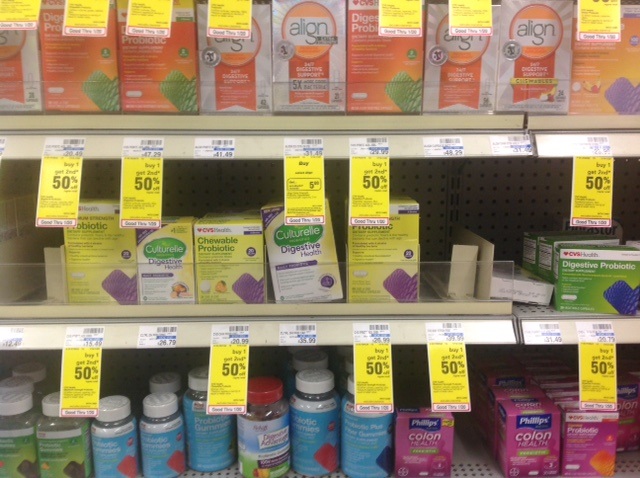 shelves in a pharmacy containing digestive health products